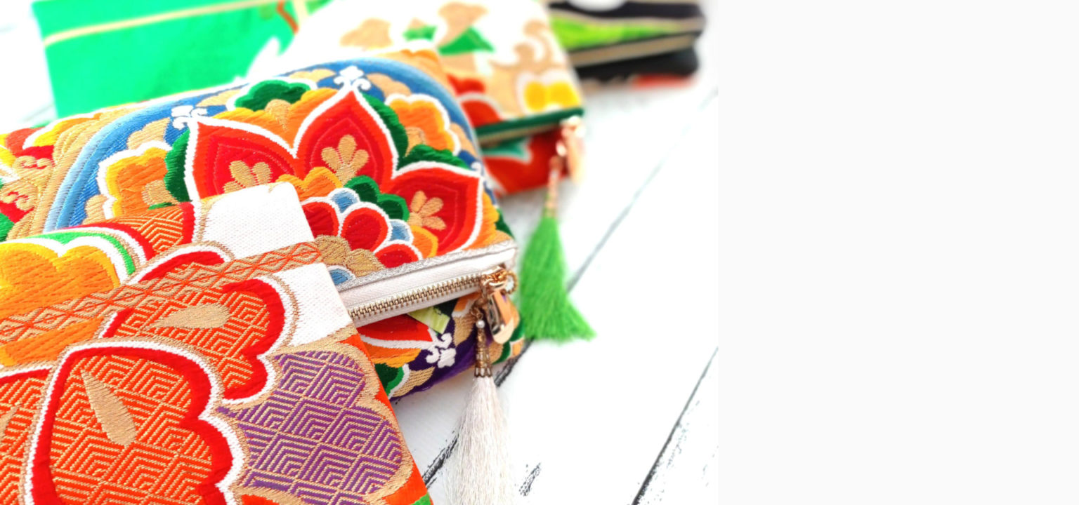 Obi silk pouch with a green tassel