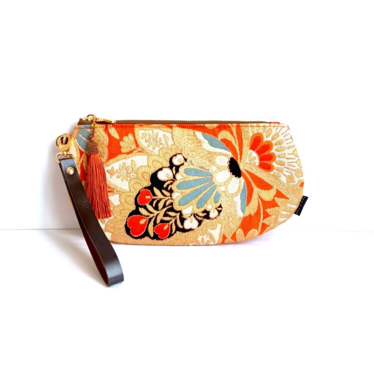 wristlet_clutch_crescent_golden_orange