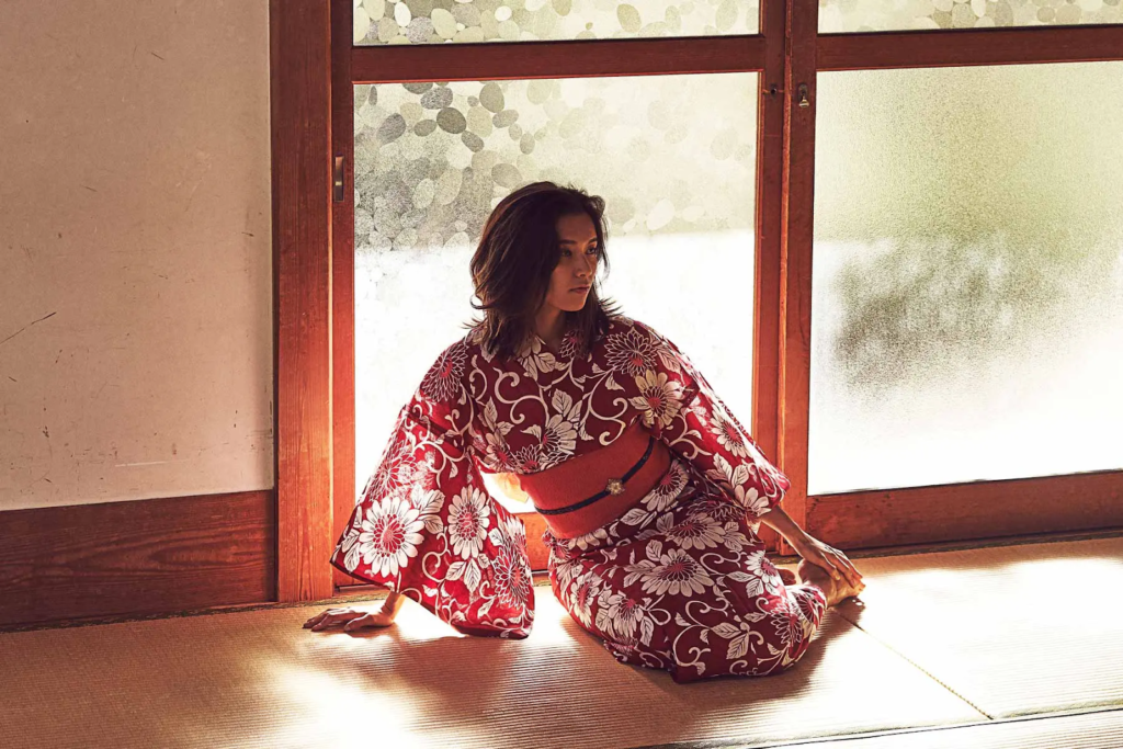 Japanese woman adorned in second hand Obi fabric.
